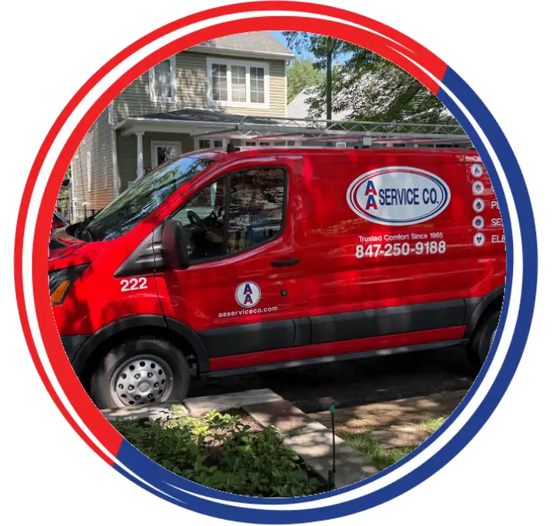 A red A Service Co. van is parked on a residential street in front of a house with trees and sunlight in the background.